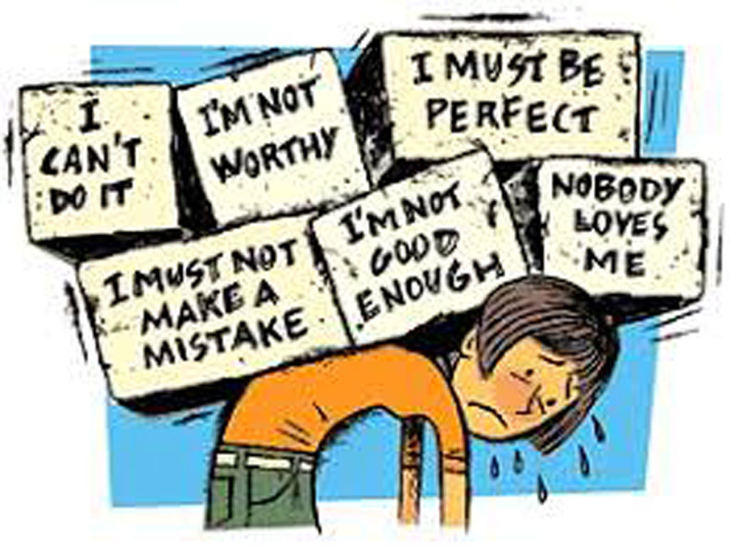 Animated drawing a figure wearing green trousers and an orange top bending over and struggling under the strain of having six boxes on their back. The boxes say 'I can't do it', 'I'm not worthy', 'I must be perfect', 'I must not make a mistake', 'I'm not good enough' and 'nobody loves me'.